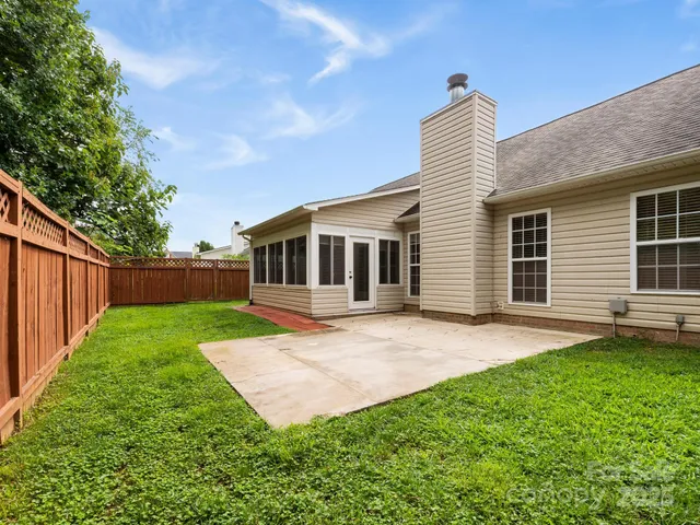 a view of a backyard with a garden