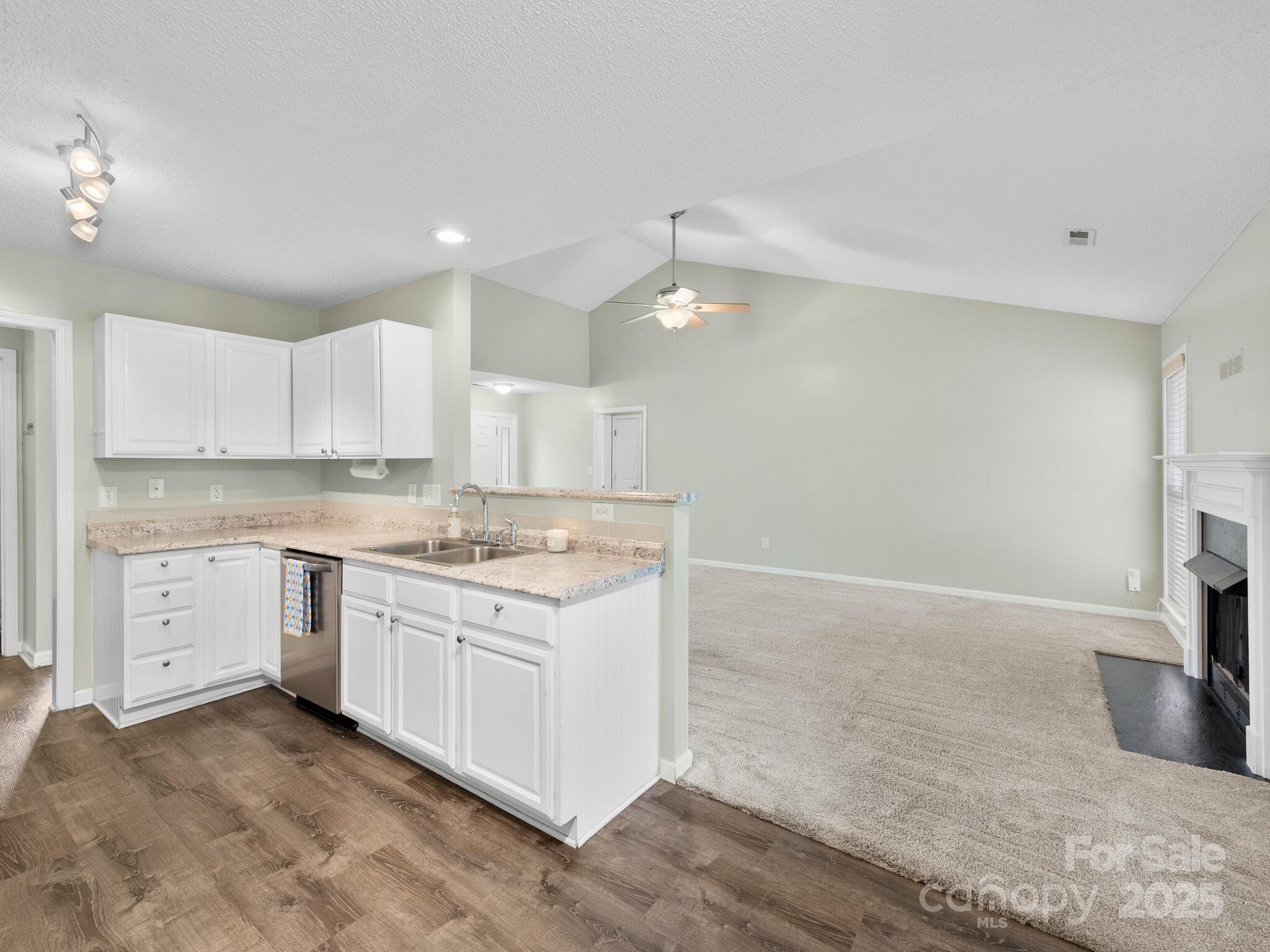 42 Morning Mist Road Fletcher, NC 28732 - Photo 8 of 25 a kitchen with a sink stove and cabinets