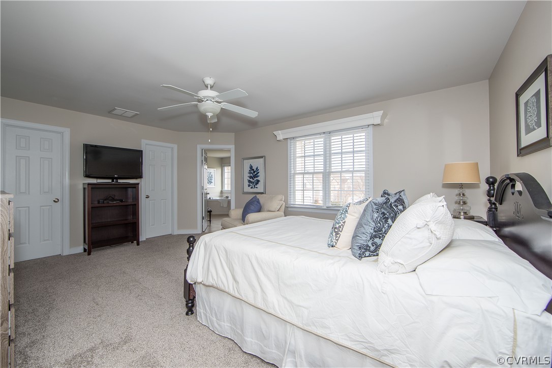 1000 Cohen Trail Midlothian, VA 23114 - Photo 27 of 41 a bedroom with a bed and a flat screen tv