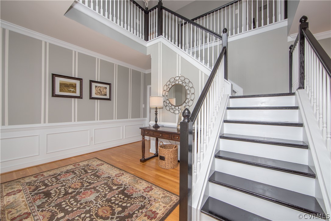 1000 Cohen Trail Midlothian, VA 23114 - Photo 4 of 41 a view of staircase with wooden floor and a rug