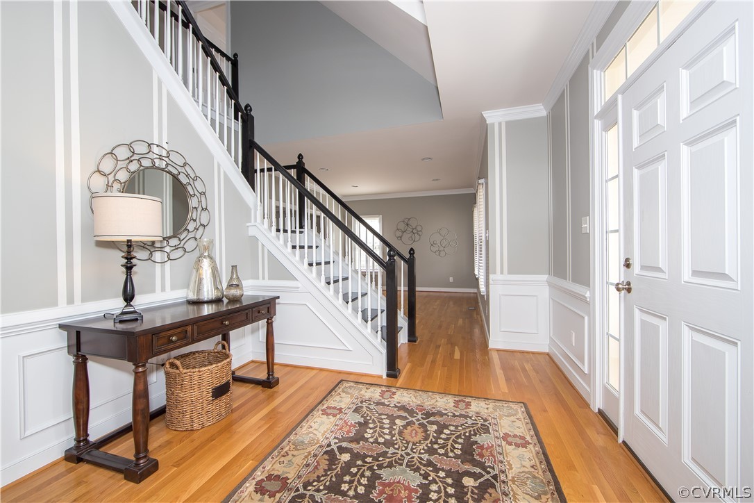 1000 Cohen Trail Midlothian, VA 23114 - Photo 5 of 41 a view of a hallway with wooden floor and staircase