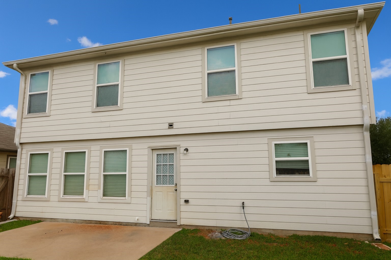 3027 Upland Spring Trace Katy, TX 77493 - Photo 4 of 6 a front view of a house with a yard