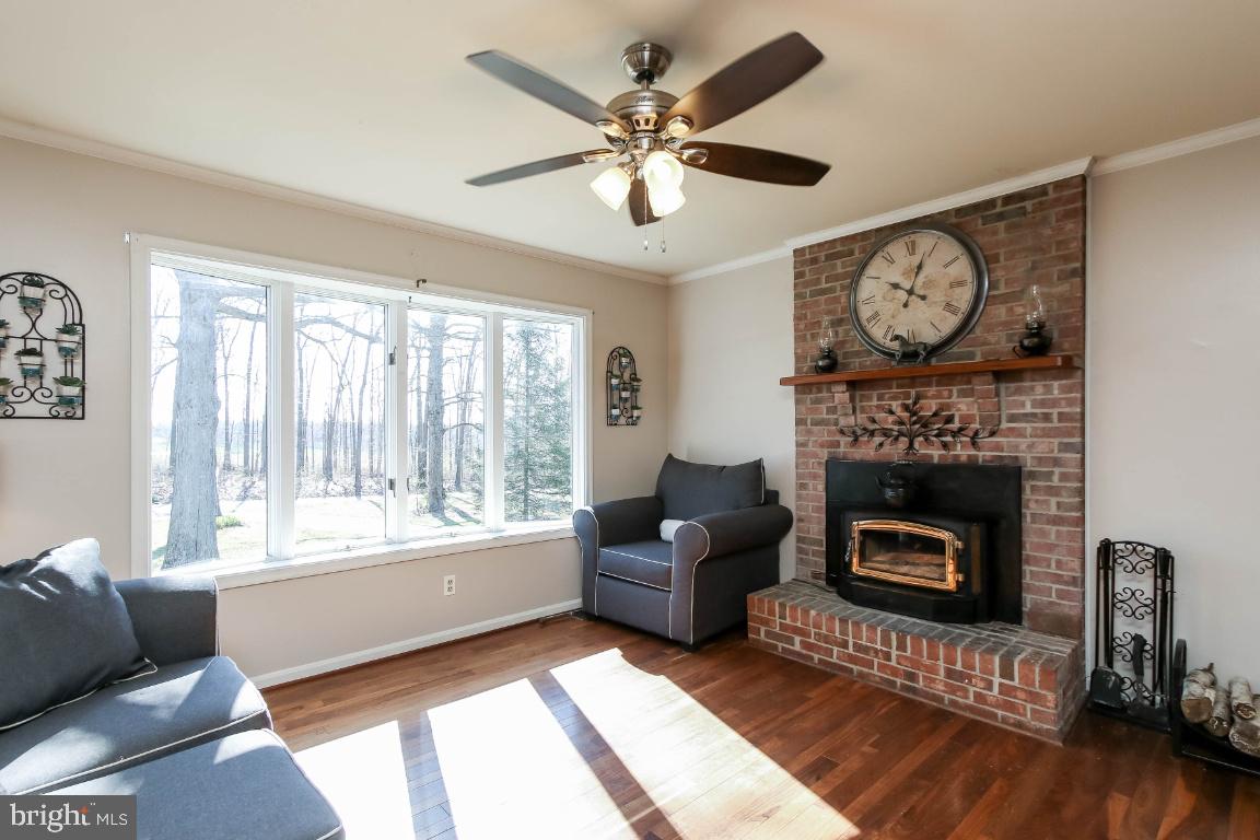 150 Dutrow Road Westminster, MD 21157 - Photo 3 of 30 Bright Living Room w/ Bay Window & Woodburning FP