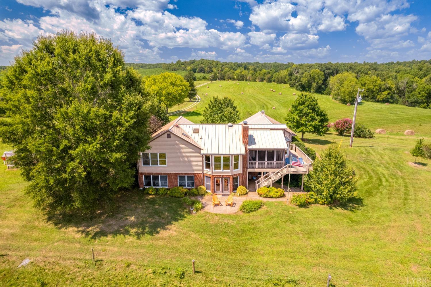 3023 Featherfin Road Prospect, VA 23960 - Photo 4 of 36 a aerial view of a house with a big yard and large trees
