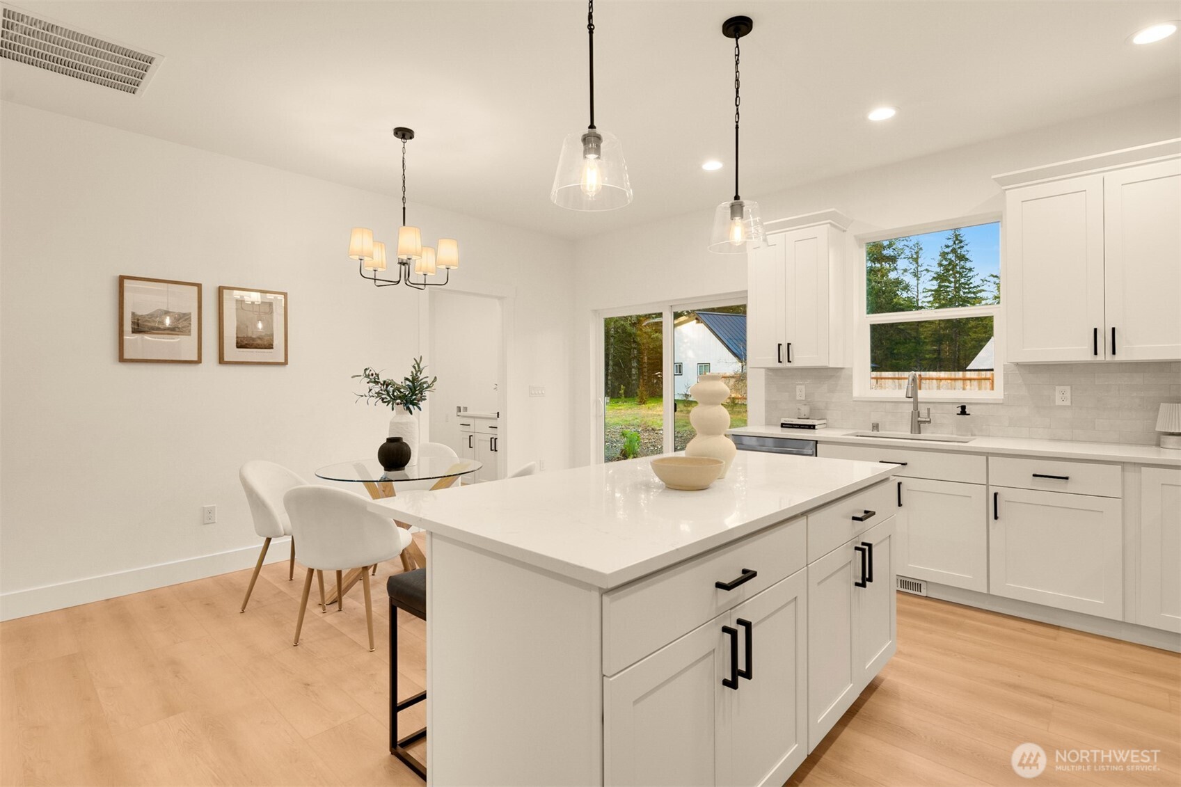 3000 West Martin Road Shelton, WA 98584 - Photo 15 of 38 a kitchen that has a sink and a table in it