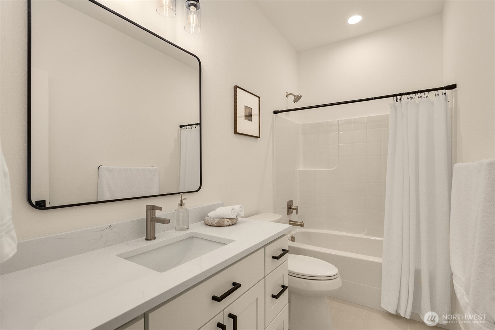 3000 West Martin Road Shelton, WA 98584 - Photo 24 of 38 a bathroom with a granite countertop sink toilet and shower