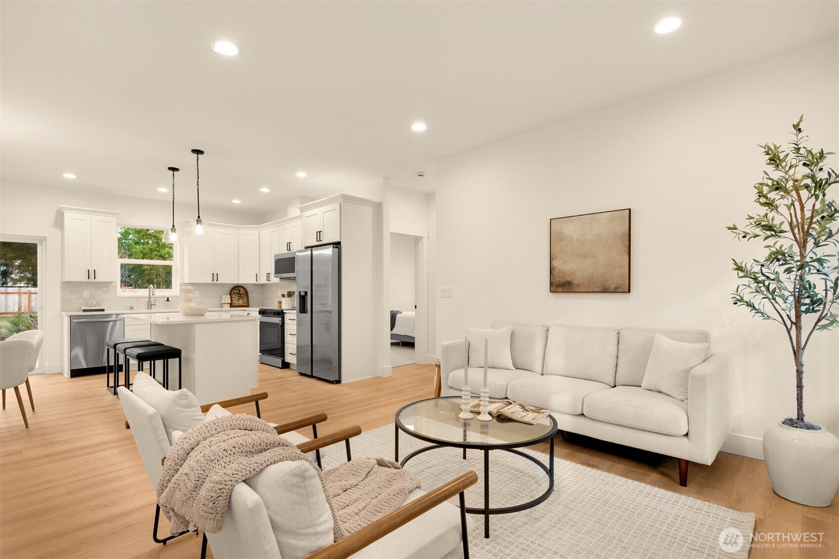 3000 West Martin Road Shelton, WA 98584 - Photo 5 of 38 a living room with furniture kitchen area and a wooden floor