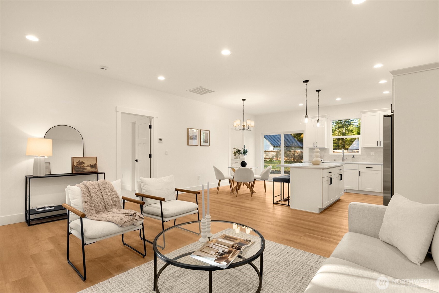 3000 West Martin Road Shelton, WA 98584 - Photo 6 of 38 a living room with furniture kitchen view and a wooden floor
