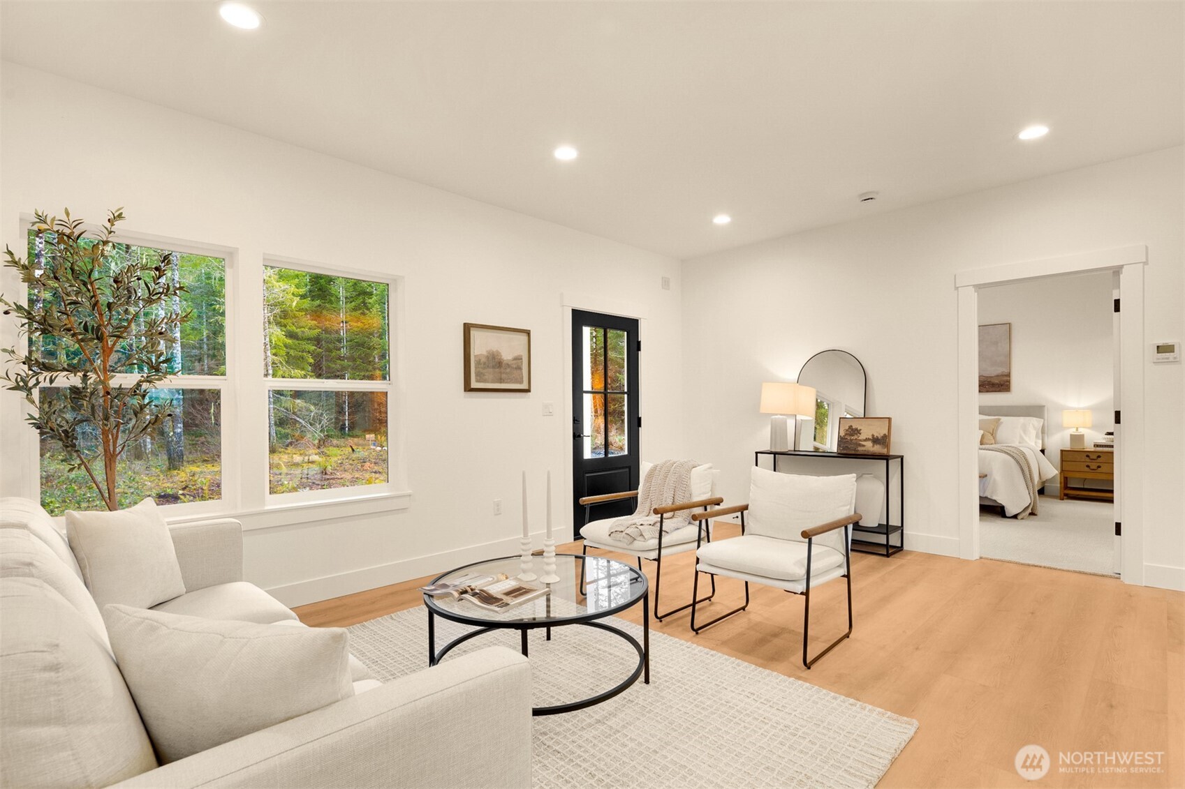 3000 West Martin Road Shelton, WA 98584 - Photo 9 of 38 a living room with furniture a rug and a large window