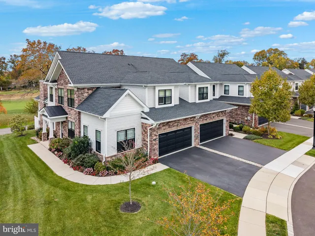 a view of a chairs on the roof deck