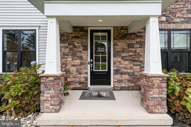 a front view of a house with a windows