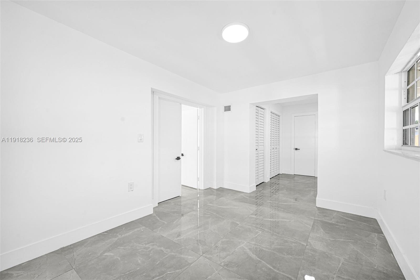 4040 Southwest 108th Avenue Miami, FL 33165 - Photo 29 of 29 a view of an empty room