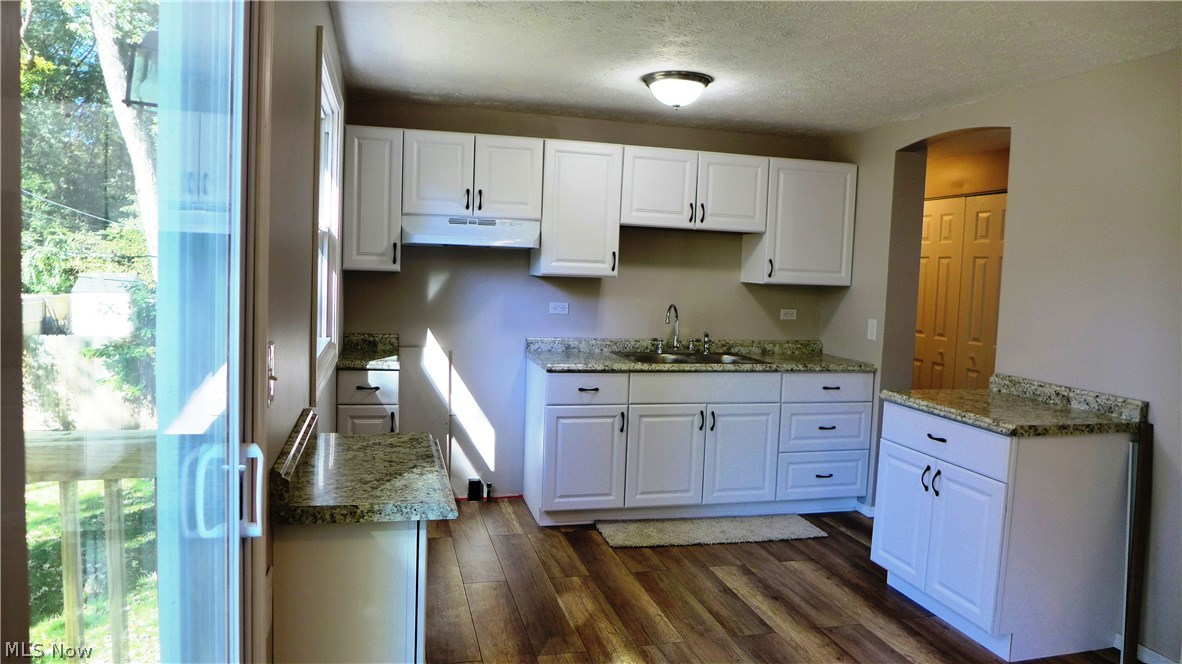 1854 Red Bird Road Madison, OH 44057 - Photo 4 of 19 Yes, new cabinets and counters and flooring in the kitchen as well