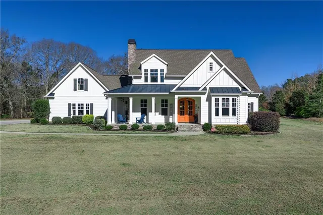 a view of an ocean with a building in the background