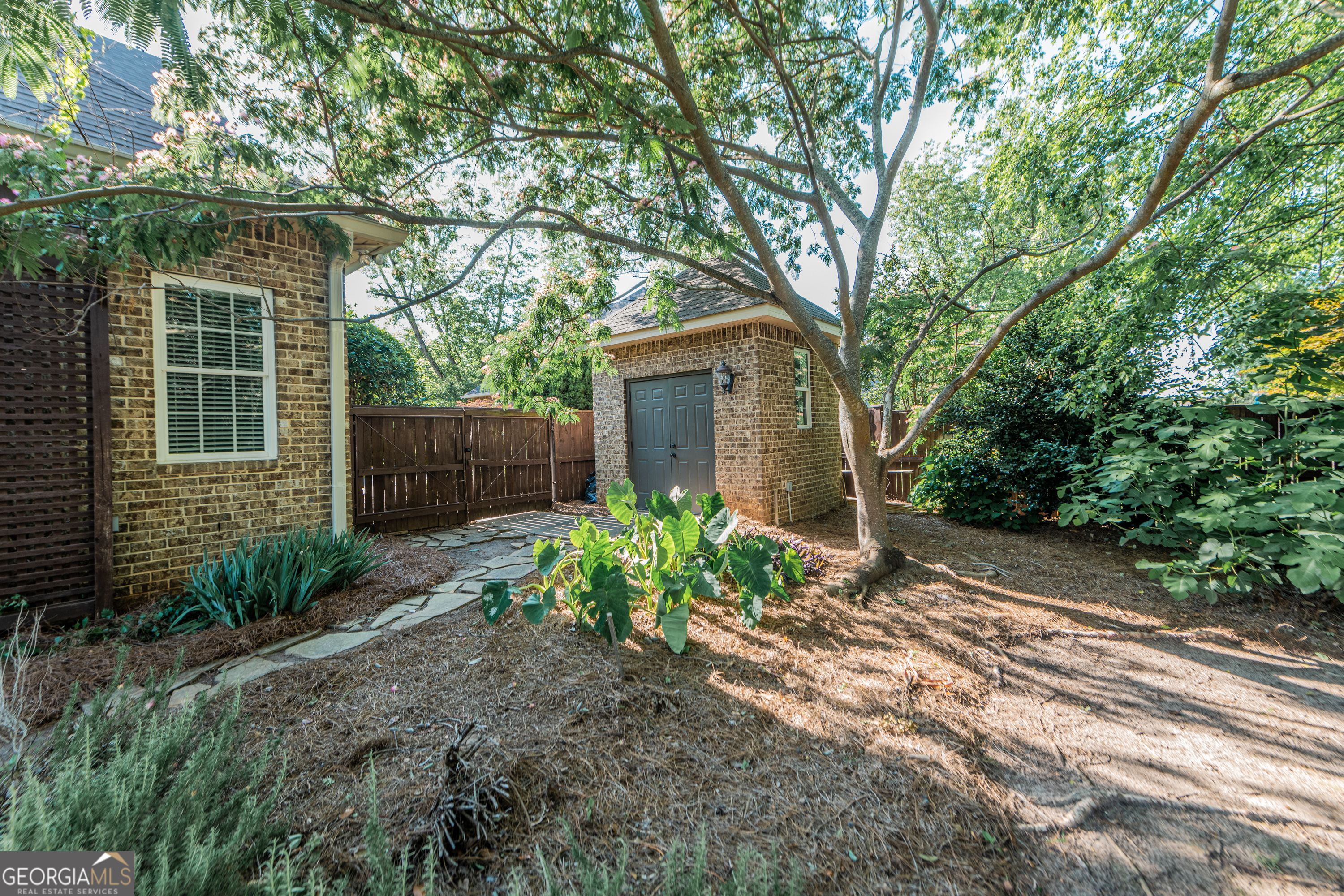 405 Old Bridge Road Warner Robins, GA 31088 - Photo 53 of 55 a view of a house with a yard and plants