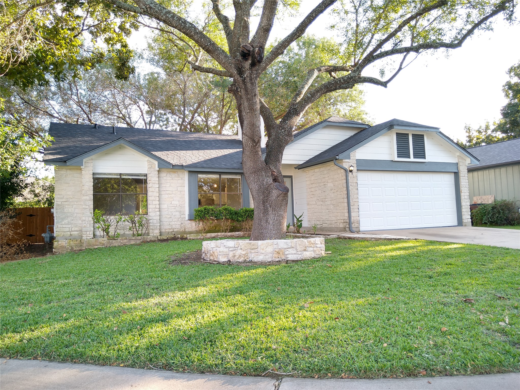 1813 Laurel Path Round Rock, TX 78664 - Photo 1 of 35 A well-maintained lawn welcomes you to this inviting residence with a convenient attached garage.