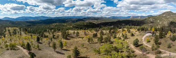 a view of a lot of trees and houses