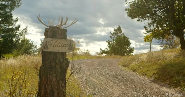 a view of a town with mountains in the background