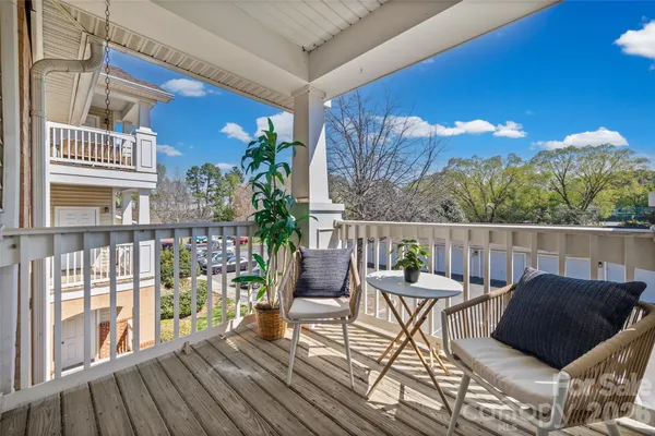 a view of a chairs on the roof deck