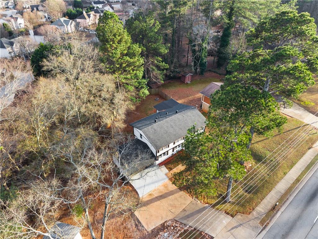 2304 South Hairston Road Decatur, GA 30035 - Photo 16 of 23 a backyard of a house with outdoor seating