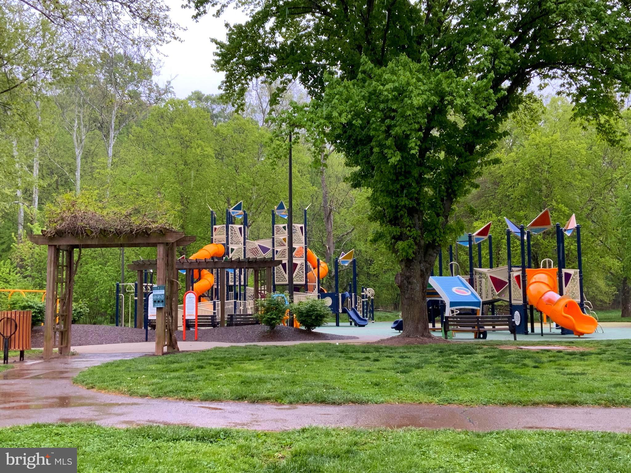 5763 Hawk Ridge Road Frederick, MD 21704 - Photo 52 of 73 a childrens park with lots of swings and slides