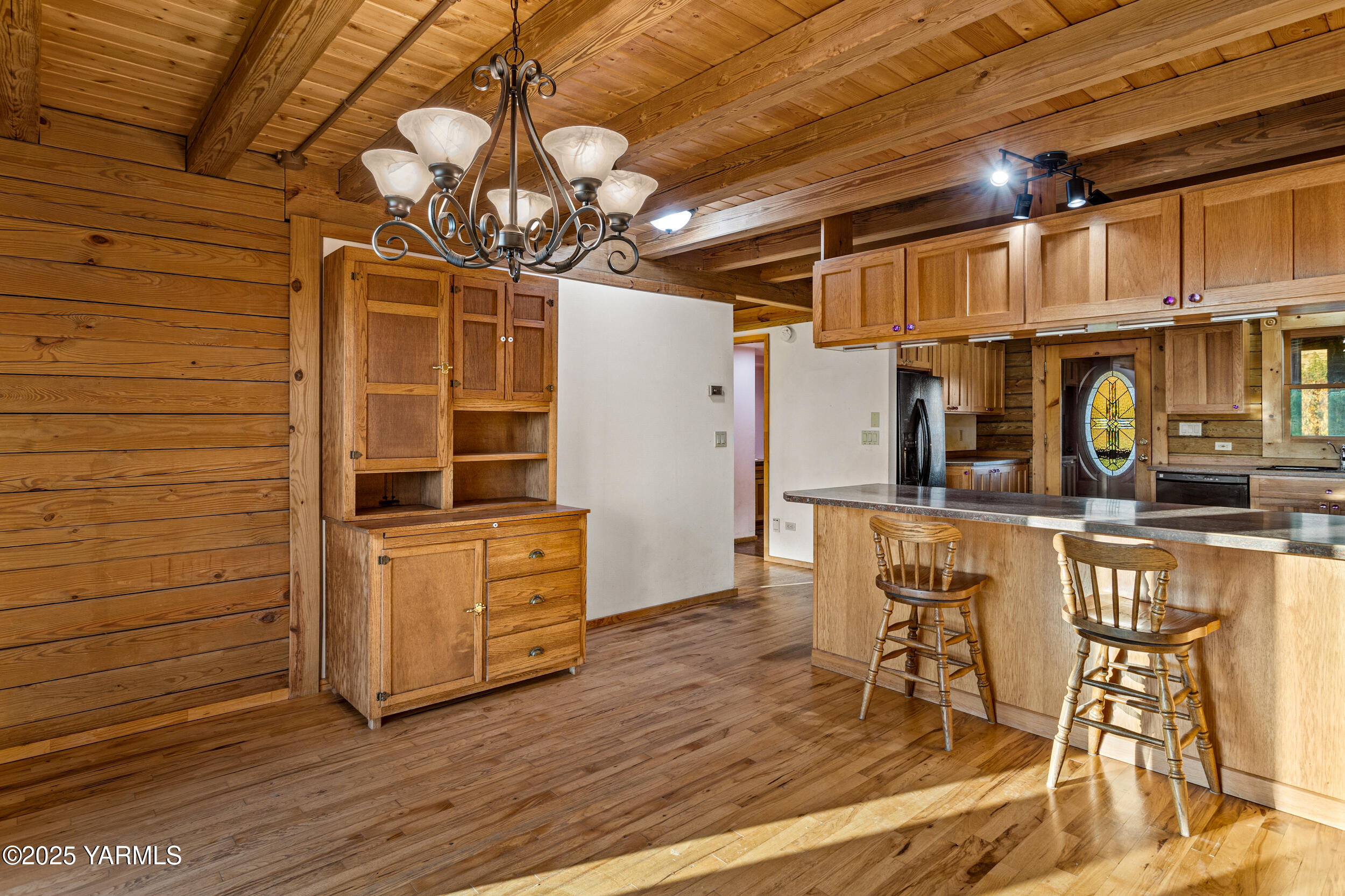 731 Selah Naches Road Selah, WA 98942 - Photo 12 of 44 a view of a storage & utility room with wooden floor