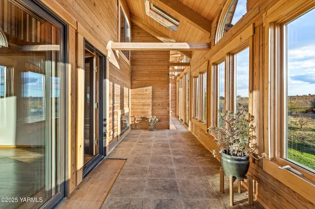 a view of a porch with a furniture