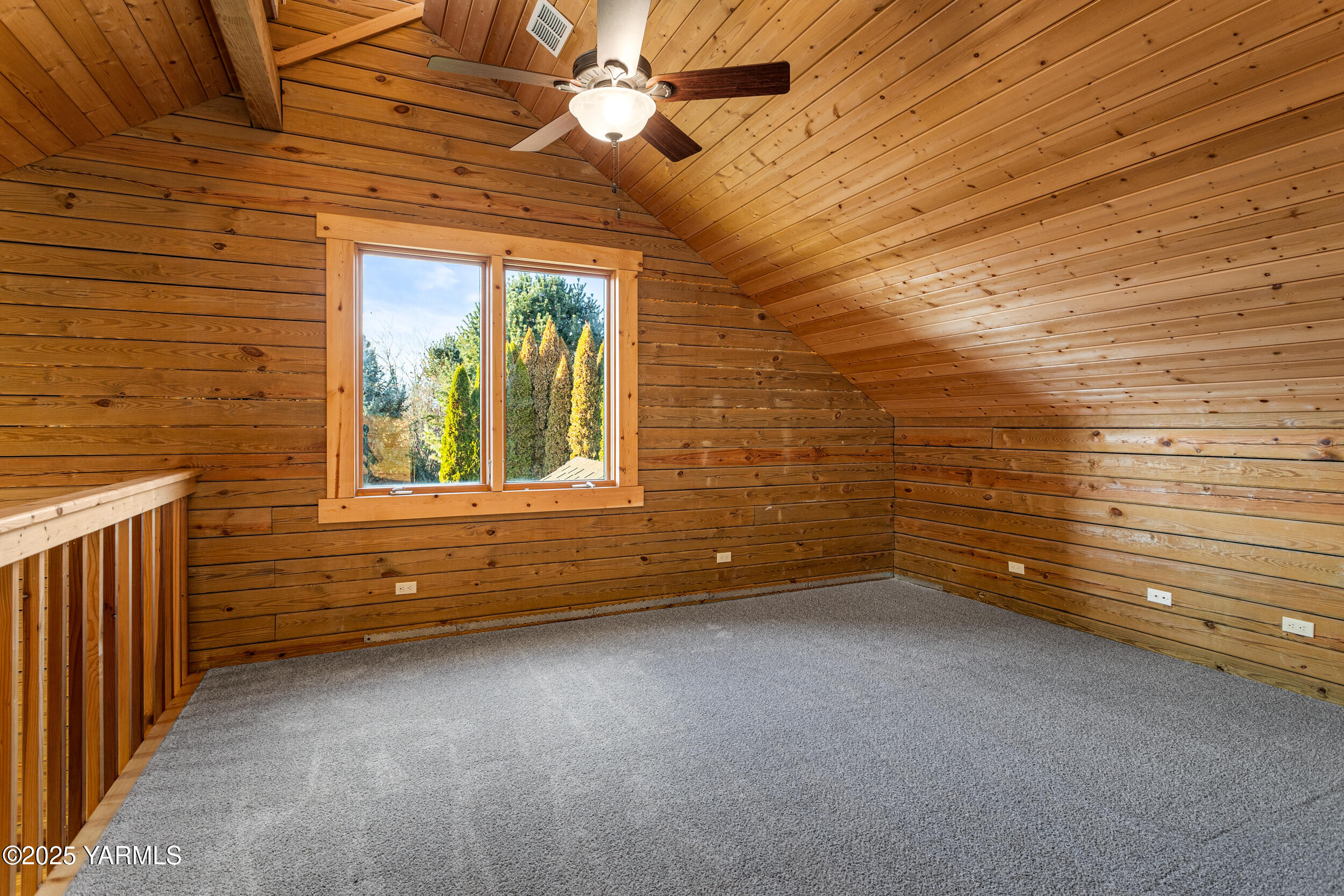 731 Selah Naches Road Selah, WA 98942 - Photo 23 of 44 a view of a livingroom with an empty space and a balcony