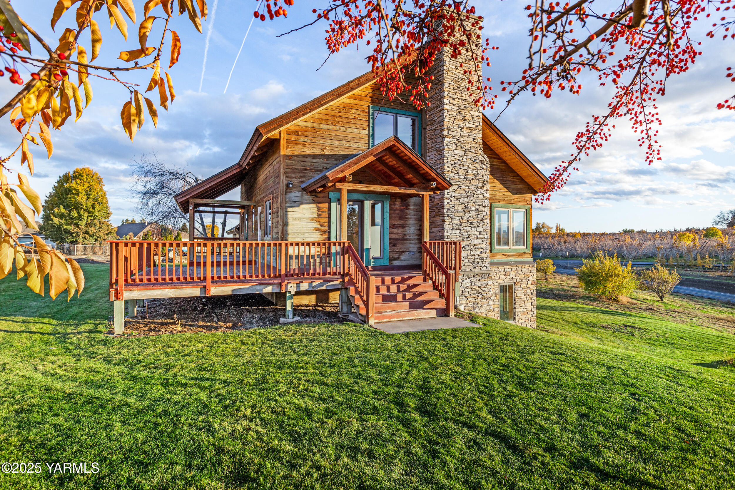 731 Selah Naches Road Selah, WA 98942 - Photo 4 of 44 a view of a chair and table in the garden