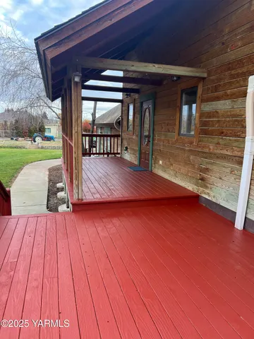 a view of a entryway with wooden floor