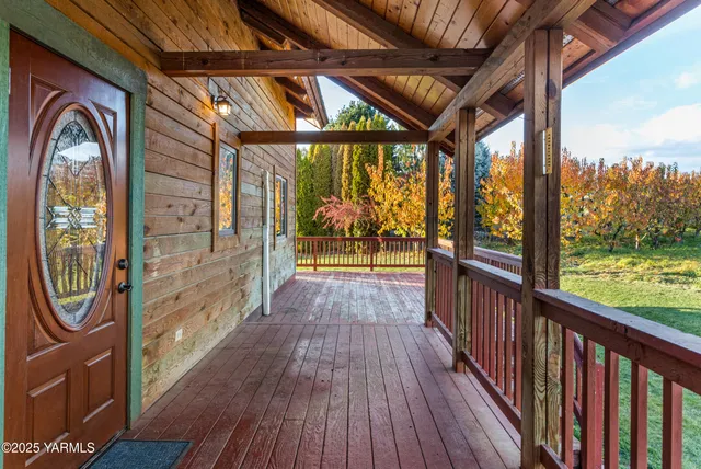 a view of a yard with an outdoor space