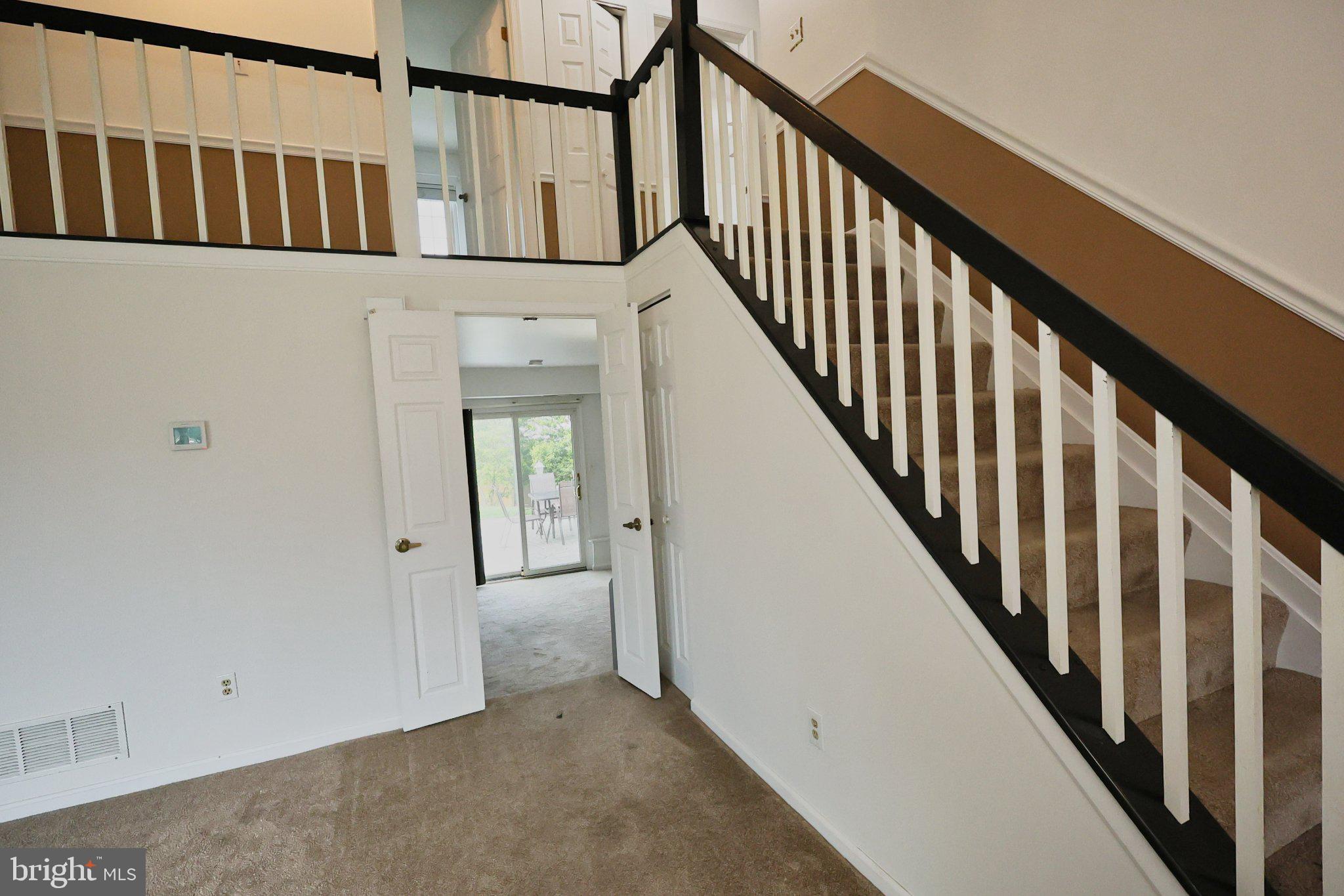 4402 Fieldgreen Road Nottingham, MD 21236 - Photo 12 of 52 Inviting entryway with staircase charm.