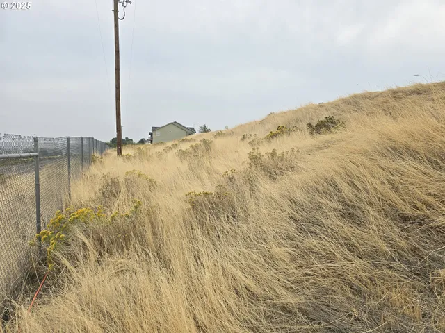 a view of ocean with a mountain