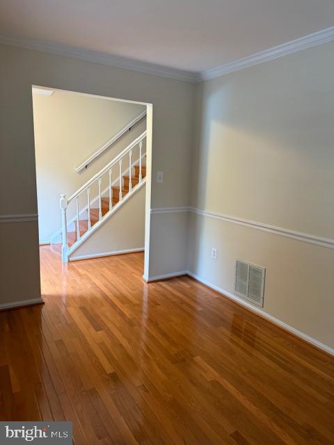 6358 Shaundale Drive Springfield, VA 22152 - Photo 3 of 54 a view of an empty room with wooden floor