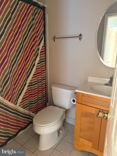6358 Shaundale Drive Springfield, VA 22152 - Photo 33 of 54 a white toilet sitting next to a small bathroom