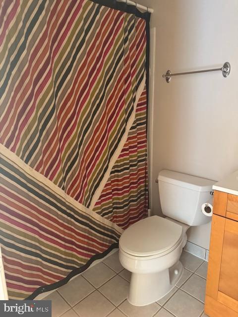 6358 Shaundale Drive Springfield, VA 22152 - Photo 34 of 54 a white toilet sitting next to a shower curtain