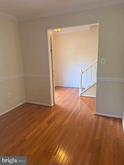 6358 Shaundale Drive Springfield, VA 22152 - Photo 4 of 54 an empty room with wooden floor and windows