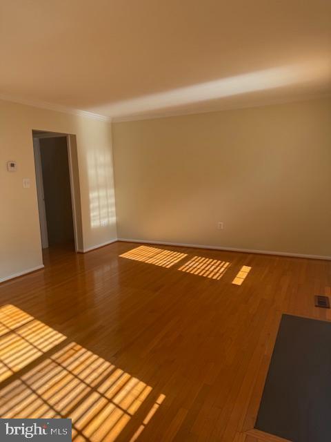 6358 Shaundale Drive Springfield, VA 22152 - Photo 6 of 54 a view of room with window and wooden floor
