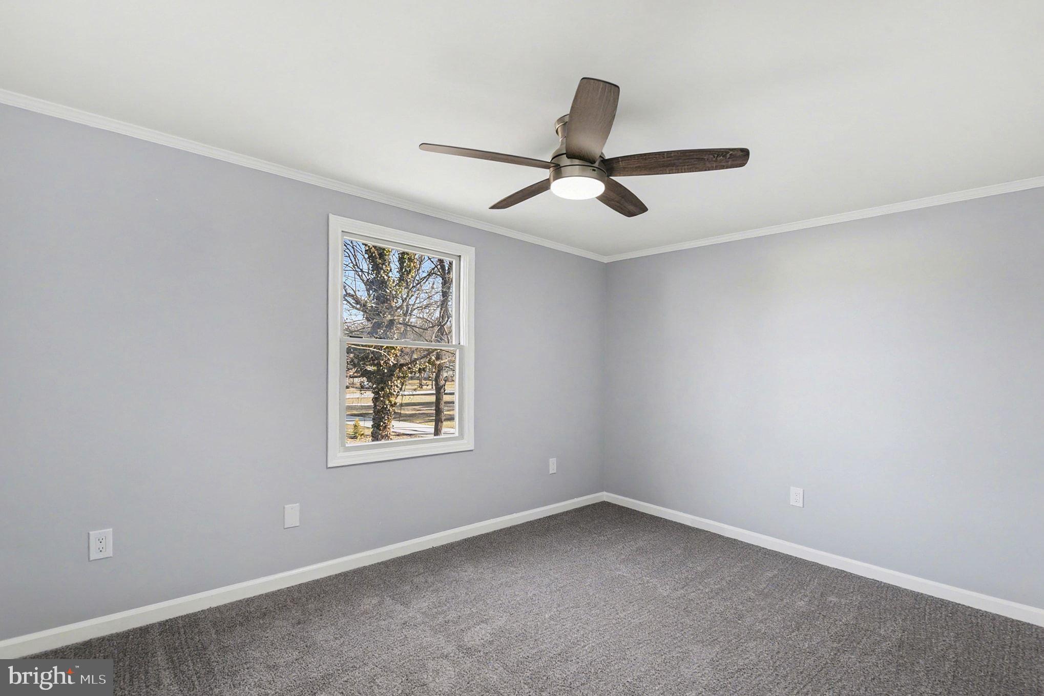 1009 Maple Road Essex, MD 21221 - Photo 16 of 26 a view of an empty room with a window