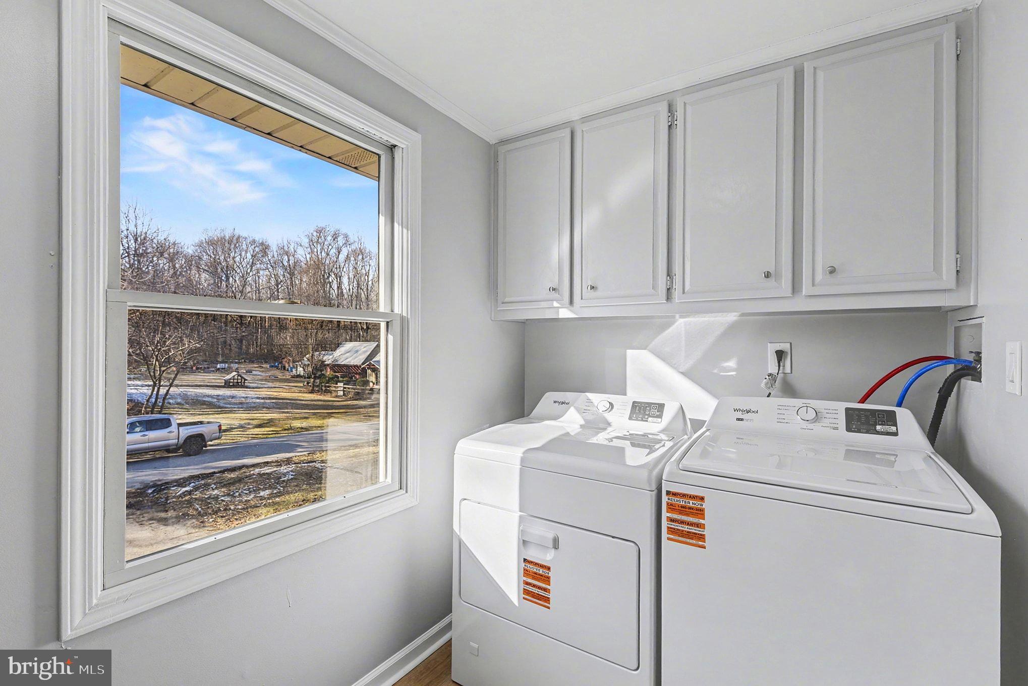1009 Maple Road Essex, MD 21221 - Photo 19 of 26 a utility room with dryer and washer