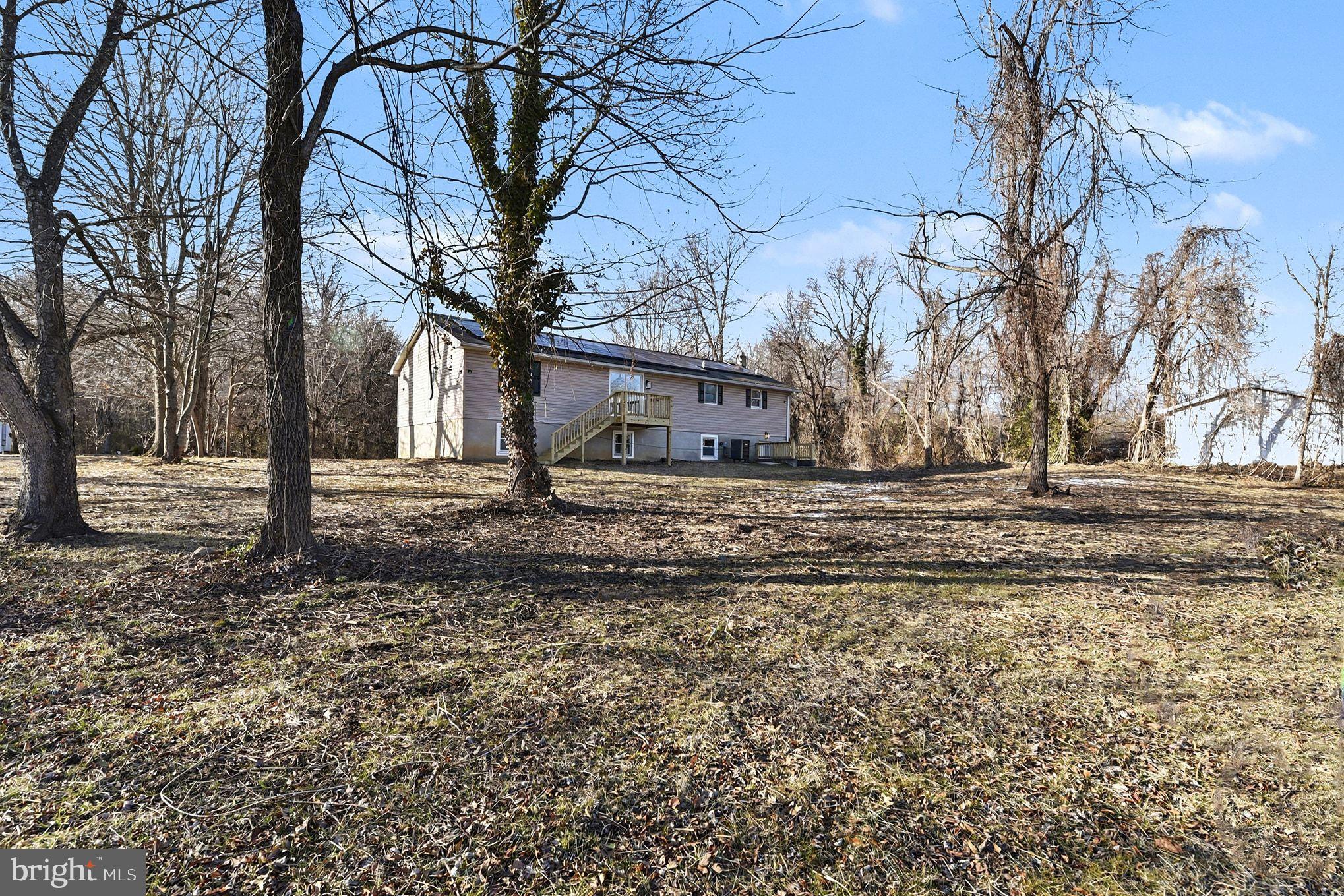 1009 Maple Road Essex, MD 21221 - Photo 24 of 26 a backyard of a house with lots of green space