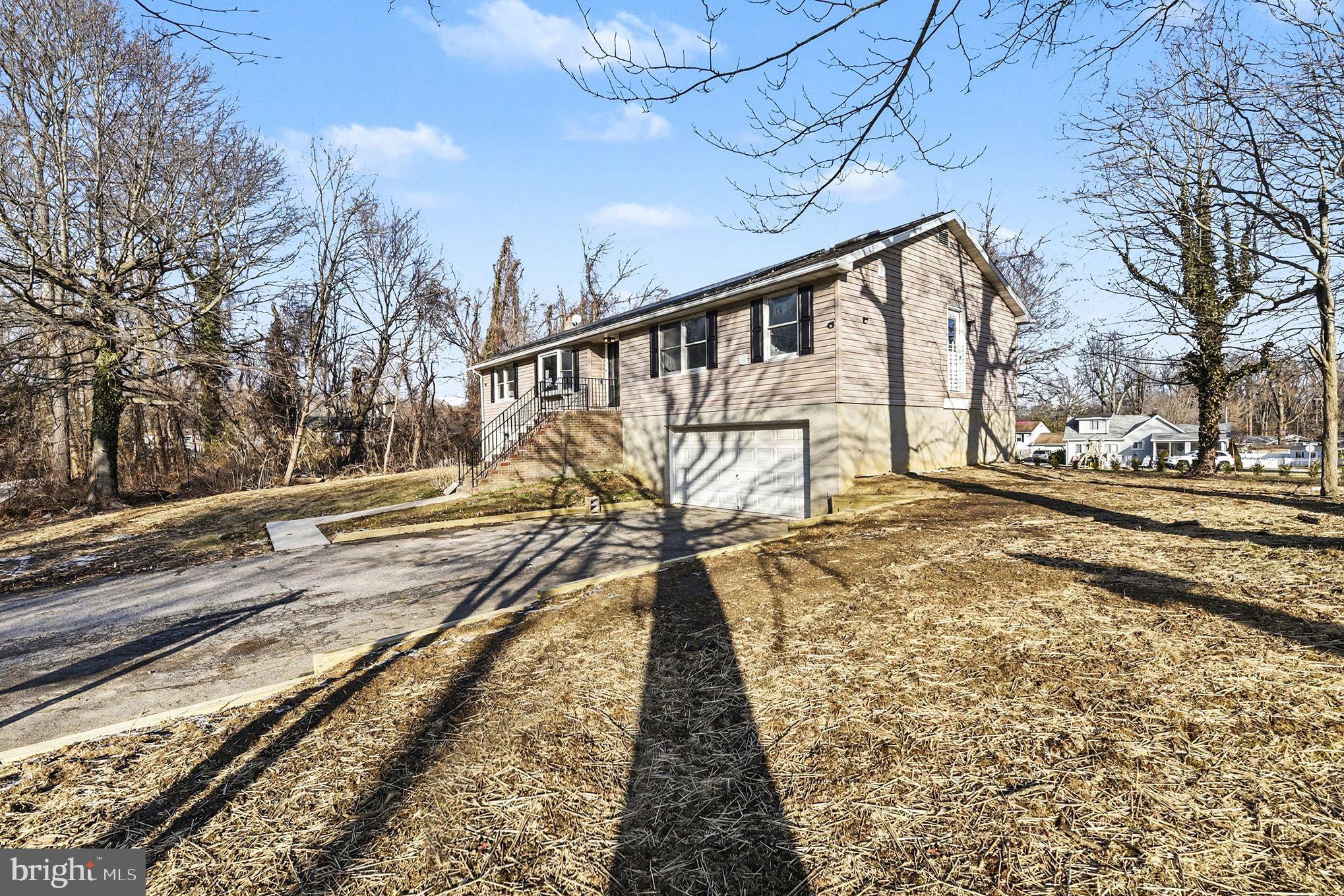 1009 Maple Road Essex, MD 21221 - Photo 26 of 26 a view of a train tracks