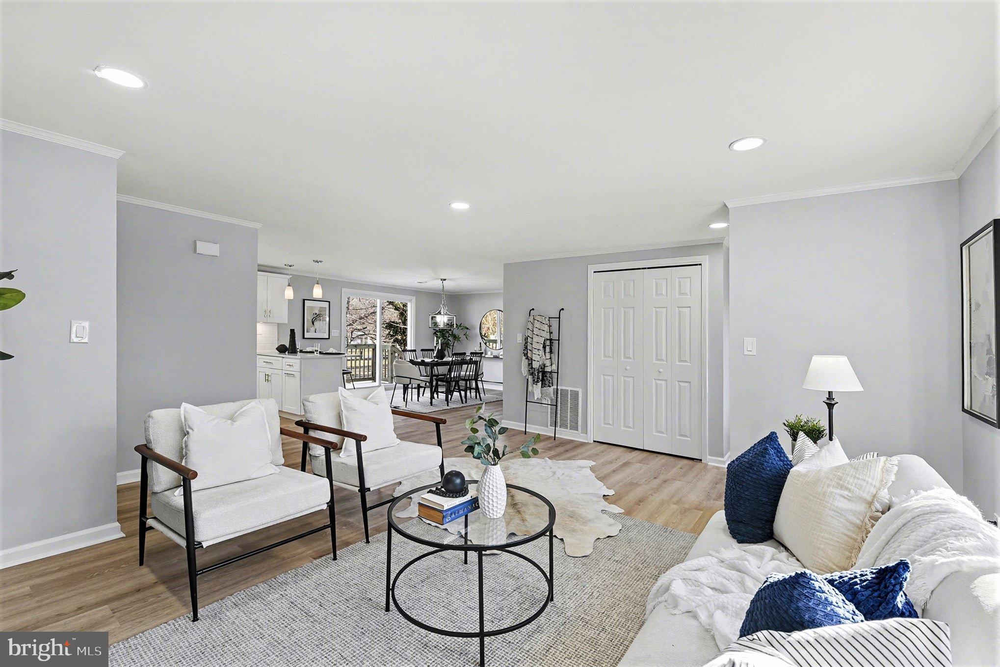 1009 Maple Road Essex, MD 21221 - Photo 9 of 26 a living room with furniture and kitchen view