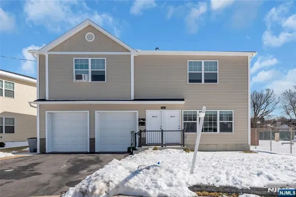 a view of a house with a snow