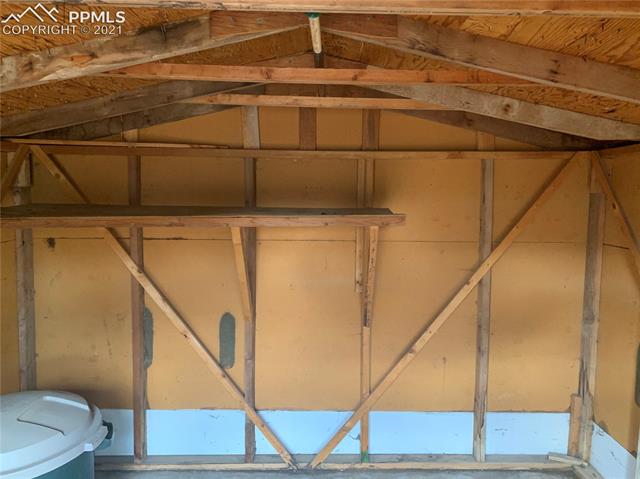 1704 Wooten Road Colorado Springs, CO 80915 - Photo 2 of 7 Clean storage shed with space for your yard necessities.