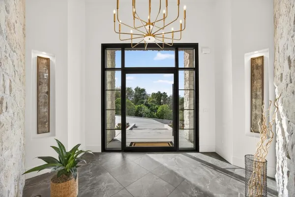 a kitchen with stainless steel appliances granite countertop a stove and a sink