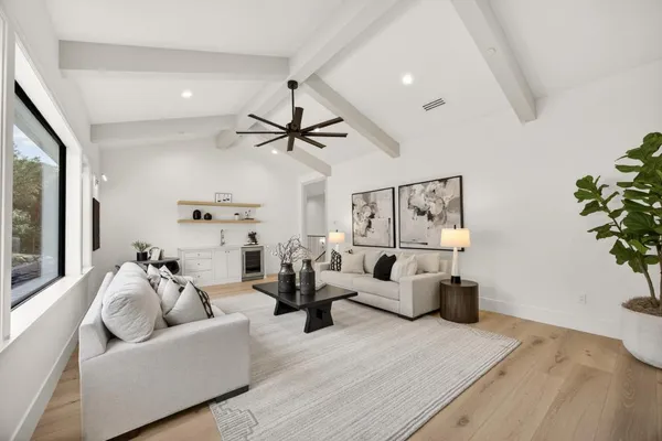 an aerial view of a house with outdoor space