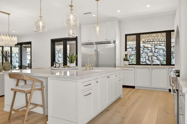 a bathroom with a sink and a window