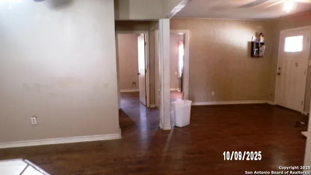 wooden floor in a hall with an entryway