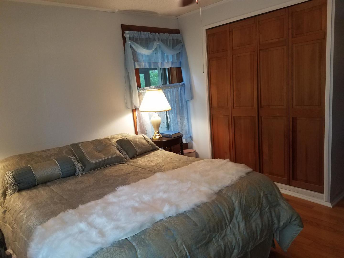 10481 Cherry Valley Road Genoa, IL 60135 - Photo 9 of 17 a bedroom with a bed and a window